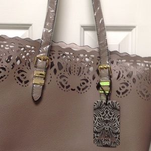 NWT Madi Studio style7769 upc 56809090027 Lazer cutout design.Still cased straps